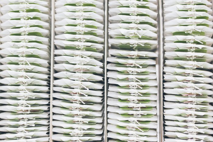 Close-up of teabags in a box from above